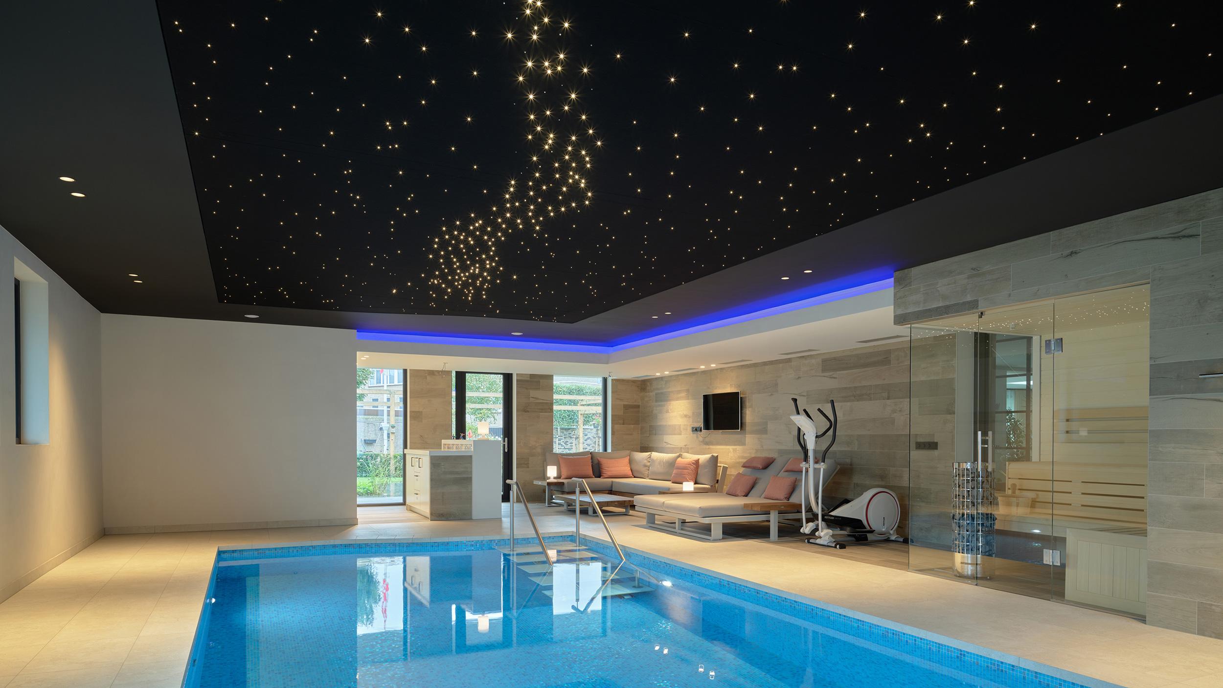 Luxury indoor swimming pool with Acosorb starry acoustic ceiling for a relaxing atmosphere