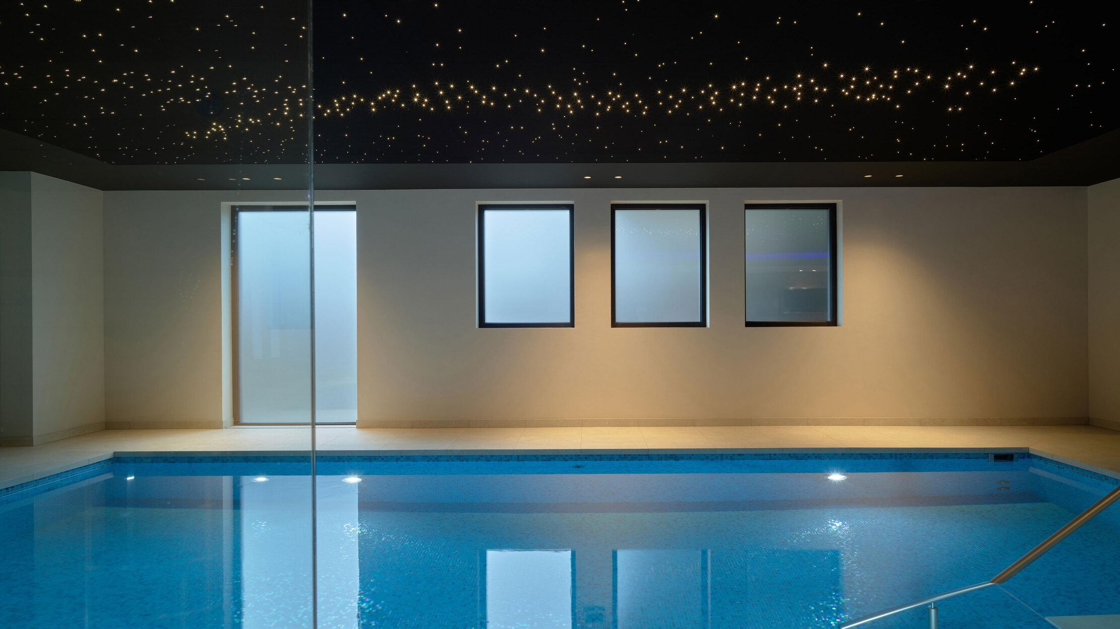 Starlight ceiling with lighting above swimming pool in Heesch